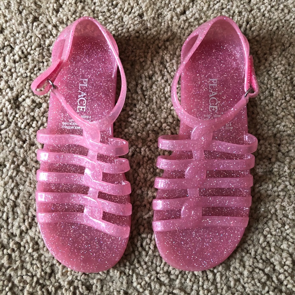 Place jelly sandals